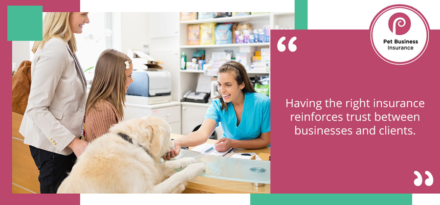 Parent and child with family dog at vet surgery reception desk